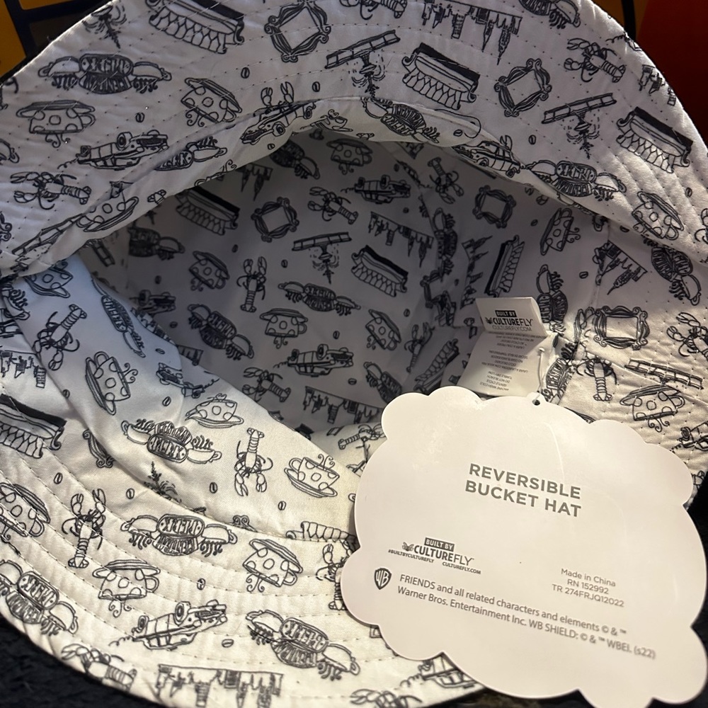 Bucket hat, never worn with tags.